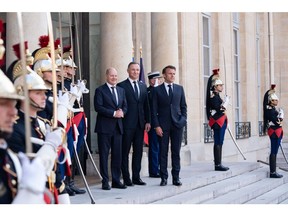 Olaf Scholz, Andrzej Duda, and Emmanuel Macron, during the Weimar Triangle summit in Paris, on June 12. Photographer: Nathan Laine/Bloomberg