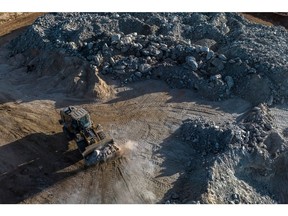 A bulldozer moves lithium ore at the Sigma Lithium Xuxa mine near Itinga, Minas Gerais state, Brazil, on Wednesday, June 14, 2023. Photographer: Dado Galdieri/Bloomberg