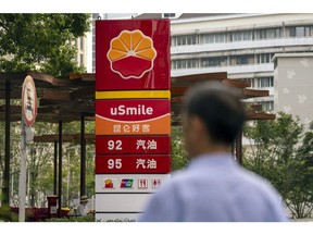 The PetroChina Co. logo at a gas station in Shanghai, China, on Friday, Aug. 11, 2023. The company is planning to distribute interim profit and the board will be reviewing the plan mid-August, according to a filing to the Shanghai Stock Exchange.