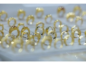 Gold rings displayed at the Korea Gold Exchange store in Seoul, South Korea, on Friday, Oct. 13, 2023. Gold is poised for its largest weekly advance in almost seven months on demand for a haven as Israel massed troops near the Gaza Strip and signaled a major ground offensive could be imminent.