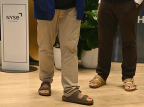 Traders at the New York Stock Exchange wear Birkenstock sandals today, during the sandal-maker's IPO.