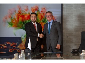 Dr. Naif Al-Shammari, Deputy CEO of Saudi EXIM Bank and Christophe Salmon, CFO of Trafigura during the signing ceremony