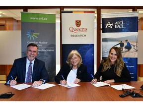 Dr. Jeff Griffin, CNL's Vice-President of Science and Technology; Dr. Nancy Ross, Queen's Vice-Principal Research; and Dr. Amy Gottschling, AECL's Vice-President of Science and Technology; sign a Memorandum of Understanding to pursue collaborative research opportunities in health and environmental sciences, clean energy, and safety and security.
