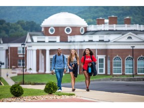 Three University of the Cumberlands students head to class during the fall 2023 semester. A new initiative seeks to drastically reduce the debt-load students take on to attend the university.