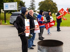 GM workers at parts plant in Woodstock on picket lines that started at midnight.