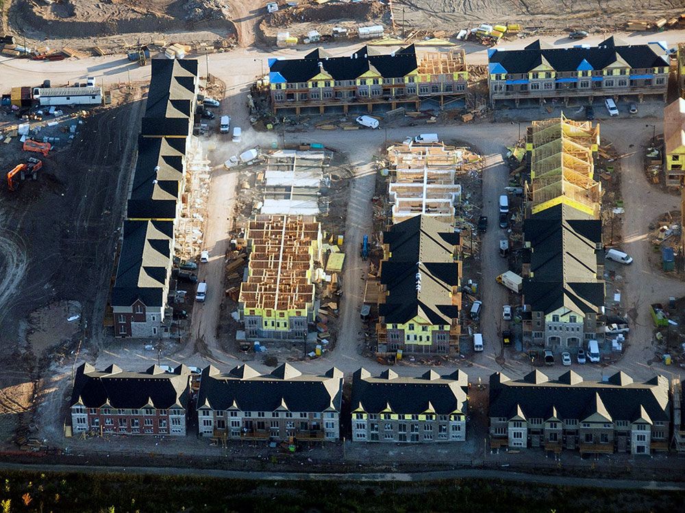 Homes under construction in Toronto. Some argue that larger household sizes in Canada means we may not need much more housing.
