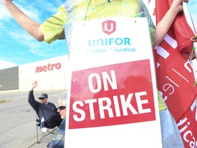 Striking Metro workers in August. A tight job market has tilted the balance of power a bit more toward workers in recent contract talks.