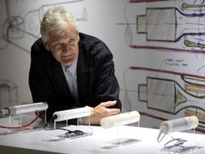 British industrial design engineer and founder of Dyson Ltd., James Dyson, with the company's products in Paris.
