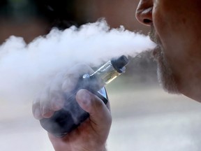 A man smoking an e-cigarette in Portland, Maine.