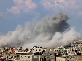 Smoke billows after an Israeli air strike in Rafah in the southern Gaza Strip on Oct. 16, 2023.