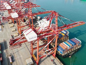 Cranes and shipping containers at Qingdao port in China's eastern Shandong province.