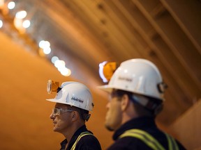 BHP CEO Mike Henry aims to dominate potash globally through Canada 12 Employees in a storage barn at the Nutrien Ltd. Cory potash facility in Saskatoon, Sask.