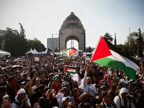 People take part in a demonstration in support of Palestine in Mexico City.