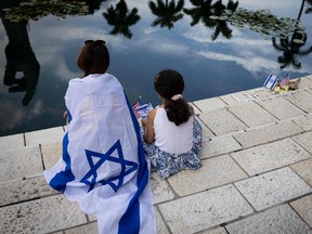 People attend the Israel Solidarity Rally organized by the Greater Miami Jewish Federation at the Holocaust Memorial in Miami Beach, Florida, on Oct. 10.