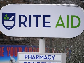 A Rite Aid sign stands in front of one of the drugstore's locations in Pittsburgh on Monday, Jan. 23, 2023. Rite Aid's plan to close more stores as part of its bankruptcy process raises concern about how that might hurt access to medicine and care. The drugstore chain said late Sunday, Oct. 15, that its voluntary Chapter 11 process will allow it to speed up its plan to close underperforming stores.