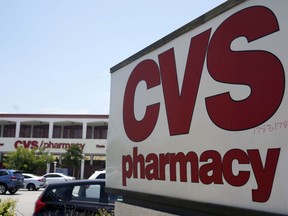FILE - A sign marks a CVS branch on Tuesday, May 16, 2023, in Pasadena, Calif. CVS Health is pulling from its drugstore shelves, Friday, Oct. 20, some cough-and-cold treatments that contain an ingredient that has been deemed ineffective by doctors and researchers.