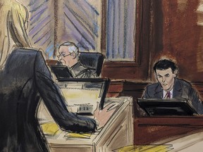In this courtroom sketch, FTX founder Sam Bankman-Fried, right, is cross-examined by Assistant US Attorney Danielle Sassoon, left, in Manhattan federal court, Thursday, Oct. 26, 2023, in New York.