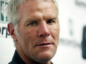 FILE - Former NFL quarterback Brett Favre speaks with reporters prior to his induction to the Mississippi Hall of Fame, Aug. 1, 2015, in Jackson, Miss. Favre will answer questions under oath about the misspending of federal welfare money in Mississippi, where public money intended to help some of the nation's poorest people was used to fund pet projects he and other well-connected people supported. A notice of deposition filed Monday, Oct. 2, 2023, by attorneys for Mississippi's Department of Human Services shows Favre will give sworn testimony on Oct. 26.