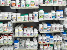 Prescription drugs on pharmacy shelves in Montreal.