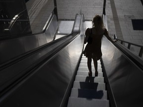 A new study says the number of Canadians struggling with their monthly mortgage payment is on the rise, along with worries of potentially higher payments when it comes time to renew with their bank. A person uses an escalator in Utrecht, Netherlands, Friday, Aug. 12, 2022.