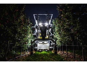 The advanced.farm BetterPick robotic apple harvester picks fruit at night, demonstrating one of the many benefits of autonomy