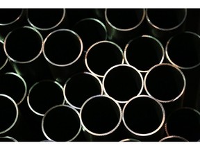 Seamless steel pipes for use in oil and gas pipelines sit in a storage area at a manufacturing plant in Russia. Photographer: Bloomberg Creative Photos/Bloomberg