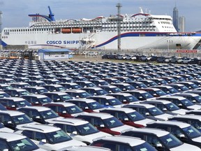 FILE - New cars wait to be transported on a dockyard in Yantai in eastern China's Shandong province on Aug. 6, 2023. China's exports and imports both fell in September from a year earlier, though they contracted at a slower pace even as global demand remained muted, according to customs data released Friday, Oct. 23, 2023. (Chinatopix via AP, File)