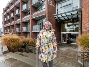 Debra Sheets in front of where she owns short-term rental units in Victoria on Oct. 17.
