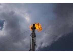 A gas flare stands at the Petroleos Mexicanos (PEMEX) Miguel Hidalgo Refinery in Tula, Hidalgo, Mexico, on Tuesday, April 18, 2017. The $2.1 billion project to develop and operate a coker unit at the Pemex's Tula refinery will turn lower-value fuel into products like gasoline and diesel. Photographer: Yael Martinez/Bloomberg