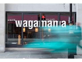 Pedestrians pass a Wagamama Ltd. restaurant in London, U.K. on Monday, Nov. 5, 2018. U.K. retail sales growth weakened in October after a summer of strong spending, according to the Confederation of British Industry.
