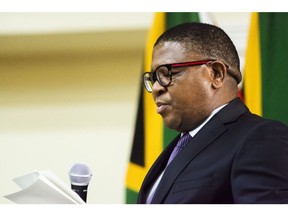 Fikile Mbalula, South Africa's transport minister, speaks during a swearing-in ceremony in Pretoria, South Africa, on Thursday, May 30, 2019. Now that South Africa's cabinet has been announced, the rand may join its emerging-market peers in being whipsawed by a trade war that has subdued markets worldwide. Photographer: Waldo Swiegers/Bloomberg