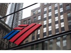 A logo hangs on the outside of a Bank of America Corp. branch in New York, U.S., on Friday, April 10, 2020. Photographer: Mark Kauzlarich/Bloomberg