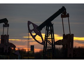 An oil pumping jack, also known as a "nodding donkey", in an oilfield near Neftekamsk, in the Republic of Bashkortostan, Russia, on Thursday, Nov. 19, 2020. The flaring coronavirus outbreak will be a key issue for OPEC+ when it meets at the end of the month to decide on whether to delay a planned easing of cuts early next year. Photographer: Andrey Rudakov/Bloomberg