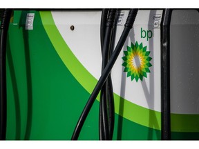 The BP logo on a fuel pump at a BP Plc petrol station on the side of the North Circular road in London, U.K., on Tuesday, Feb. 2, 2021. BP Plc showed that Big Oil has barely begun to heal the wounds from last year's historic slump, posting earnings that fell short of expectations on weak fuel sales, refining margins and gas trading. Photographer: Chris J. Ratcliffe/Bloomberg