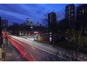Vehicles pass a Texaco Inc. petrol station, against a backdrop of the skyscrapers in the City of London, U.K., on Wednesday, March 9, 2022. U.K. petrol prices rose at the fastest pace in almost 13 years last week as the war in Ukraine sent fuel prices to record highs, government figures show. Photographer: Chris Ratcliffe/Bloomberg