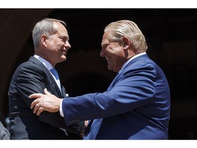 Peter Bethlenfalvy and Doug Ford in June 2022. Photographer: Cole Burston/Bloomberg
