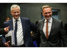 Bruno Le Maire, France's finance minister, left, and Christian Lindner, Germany's finance minister, during a Eurogroup meeting at the European Convention Center in Luxembourg, on Monday, Oct. 3, 2022. EU Finance ministers are meeting to discuss how to act in a coordinated way to shelter firms and households from surging energy prices and avoid the risk of fragmentation within the euro area. Photographer: Valeria Mongelli/Bloomberg