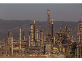 An oil refinery, operated by Bharat Petroleum Corp. Ltd., in Mumbai, India, on Saturday, Dec. 10, 2022. A senior official at India's oil ministry told reporters this month India has been buying oil from about 30 countries, and will continue to buy from anywhere including Russia beyond January. Photographer: Dhiraj Singh/Bloomberg
