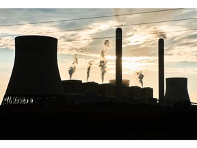 Cooling towers and chimneys at an Eskom coal-fired power station.