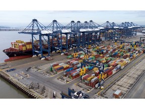 The MSC New York container ship next to shipping containers at the Port of Felixstowe, owned by a unit of CK Hutchison Holdings Ltd., in Felixstowe, UK, on Thursday, May 11, 2023. According to Bloomberg Intelligence, 1Q23 GDP figures, due to be released on Friday, May 12, will probably show an economy flatlining as industrial action weighs on growth. Photographer: Chris Ratcliffe/Bloomberg