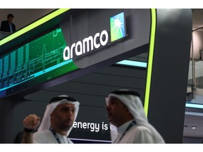 Signage above the Saudi Aramco booth on day two of the Abu Dhabi International Petroleum Exhibition and Conference (ADIPEC) in Abu Dhabi, United Arab Emirates, on Tuesday, Oct. 3, 2023. The annual strategic energy conference runs from Oct 2-5. Photographer: Christopher Pike/Bloomberg