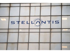 A logo on the exterior of a Stellantis NV office building in Poissy, France, on Monday, Oct. 30, 2023. Stellantis report earnings on Oct. 31. Photographer: Nathan Laine/Bloomberg