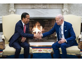 US President Joe Biden, right, shakes hands with Joko Widodo, Indonesia's president, in the Oval Office of the White House in Washington, DC, US, on Monday, Nov. 13, 2023. A close ally of President Joko Widodo is poised to lead Indonesia's military, fueling further concern over what's seen as the leader's moves to secure his political dynasty. Photographer: Al Drago/Bloomberg