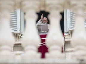 Pope Francis delivers his blessing as he recites the Angelus noon prayer from the window of his studio overlooking St.Peter's Square at the Vatican, on the occasion of All Saints Day, Wednesday, Nov. 1, 2023.