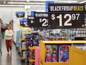 People shop for early Black Friday deals at a Walmart in California.