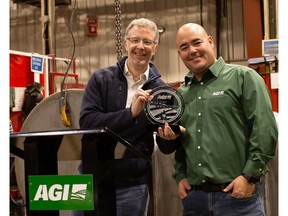 A Decade of Distinction. Paul Householder, AGI President & CEO, presents Steve Ricklefs, AGI Olds Plant Manager, with a 10 yr. No-Lost Time Incident award.
