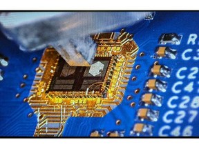 LightBundle 3mm x 4mm ASIC in 16nm FinFET on test board showing LED array and metal ferrule