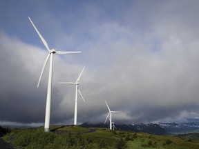 FILE - Wind turbines work on June 25, 2023, in Kodiak, Alaska. The IEA's annual world energy outlook, which analyzes the global picture of energy supply and demand, was released Tuesday, Oct. 24.