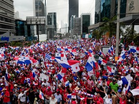 People celebrate the Panama Supreme Court's ruling against First Quantum's mining contract in Panama City, Nov. 28, 2023.