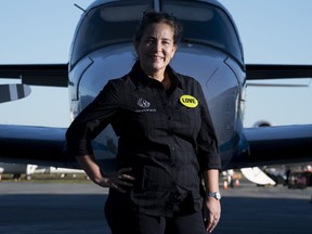 Teara Fraser, commercial pilot and owner of Iskwew Air, poses in front of her plane on the tarmac at Vancouver International Airport in Richmond, B.C., Tuesday, September 29, 2020.THE CANADIAN PRESS/Jonathan Hayward